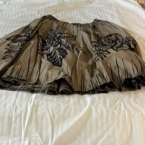 Mid length skirt. Elastic back waist band. Very full. Scattered sequins.